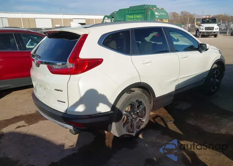 2018 Honda Cr-V Touring z USA, uszkodzony, nr VIN 2HKRW2H98JH629837